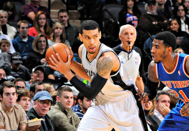 Danny Green (left) joins Tiago Splitter among San Antonio's wounded. (D. Clarke Evans/NBAE via Getty Images)